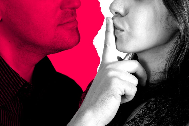 A man puts his index finger over a woman's lips to keep her quiet.
